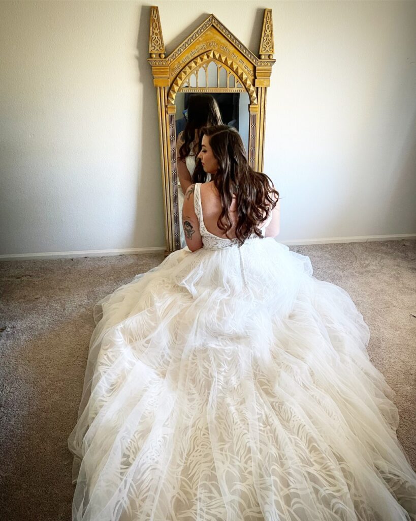 bride with unique wedding dress train