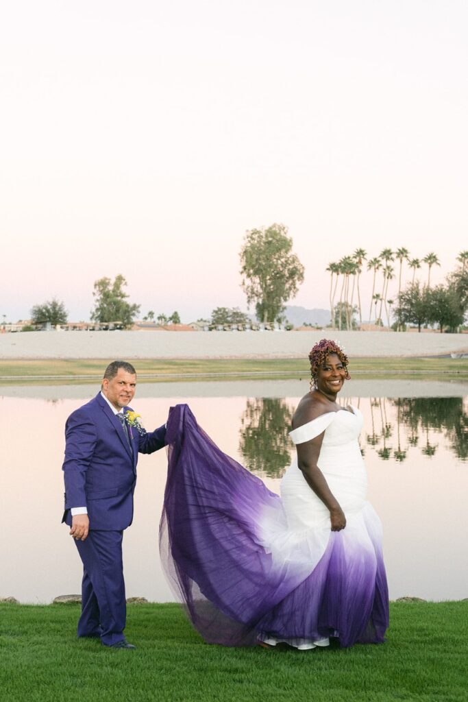 plus size bride wearing white and purple dip dyed wedding dress on golf course