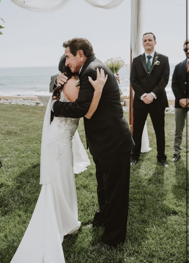 bride wearing sexy crepe beach wedding dress mexico wedding with family