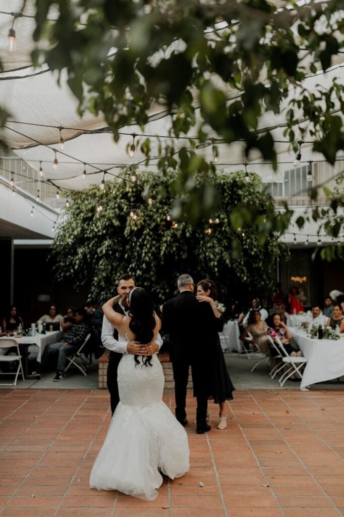 bride and groom first dance outdoors