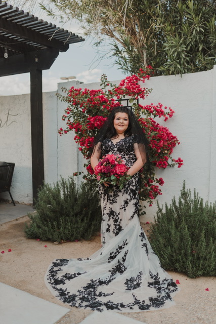 bride wearing plus size lace wedding dress groom in black shirt chandler arizona