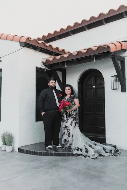 bride wearing plus size lace wedding dress groom in black shirt chandler arizona