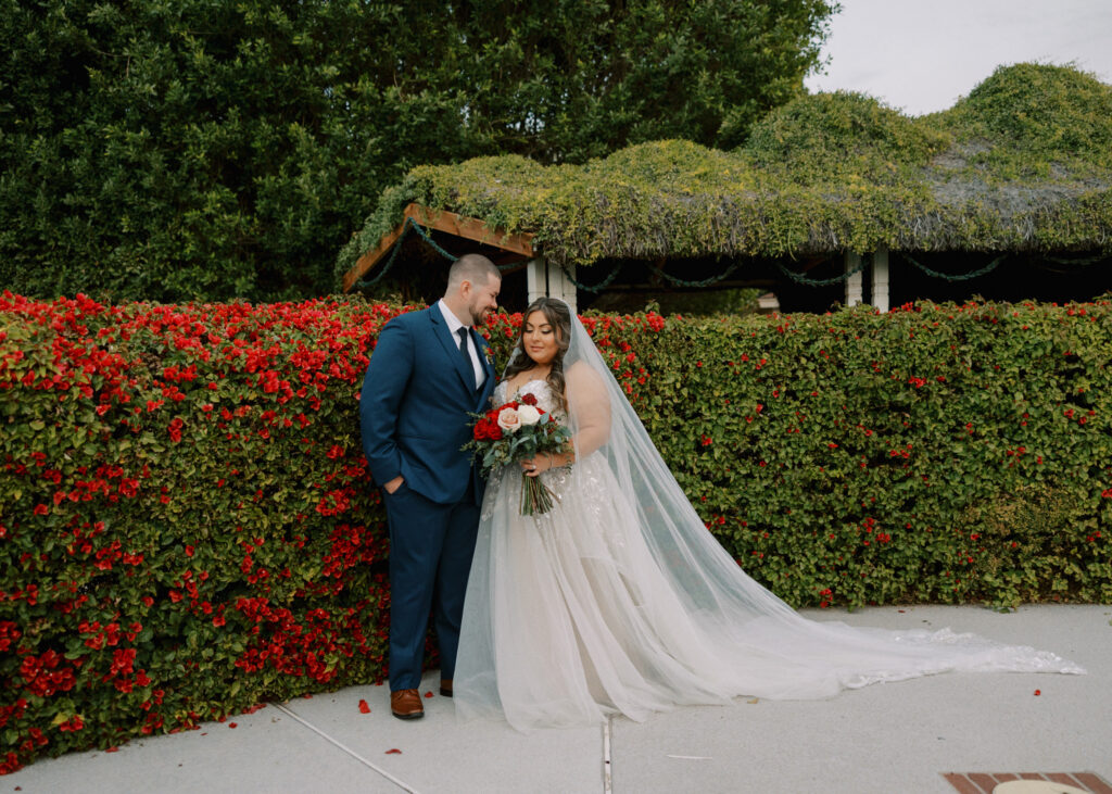 groom in blue suit with plus size bride in glam ballgown wedding dress mesa arizona