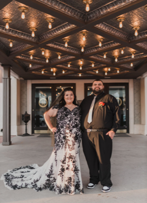 bride wearing plus size lace wedding dress groom in black shirt chandler arizona