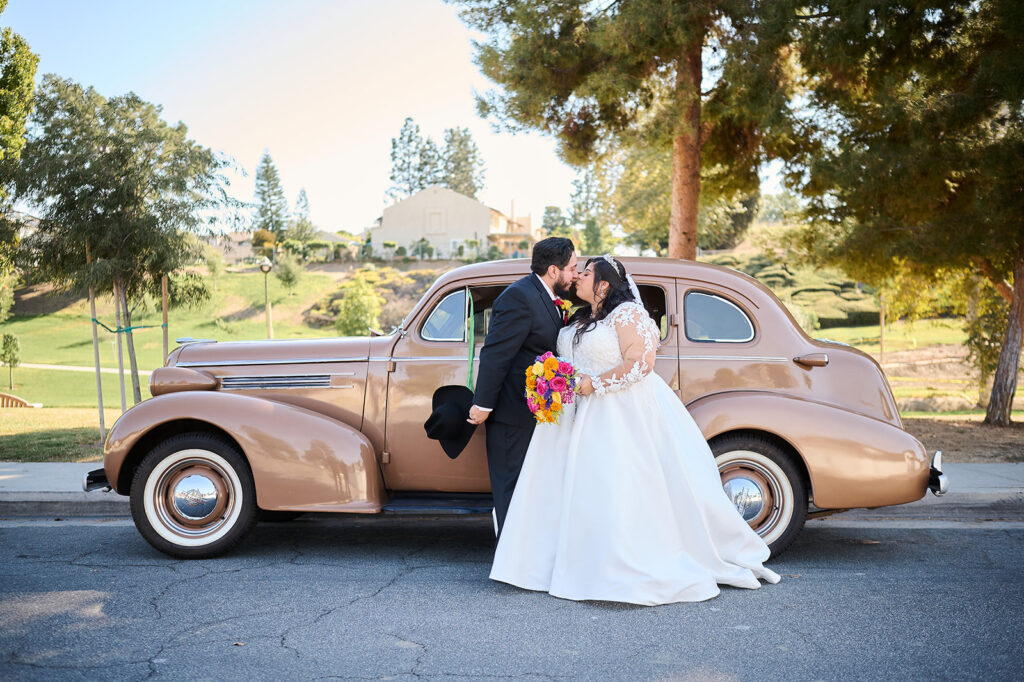 plus size bride in long sleeve plus size wedding dress whittier california with old car