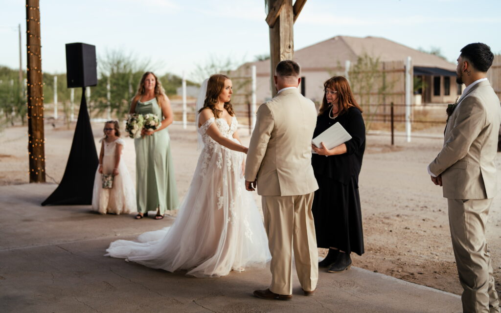 bride and groom outside barn wedding