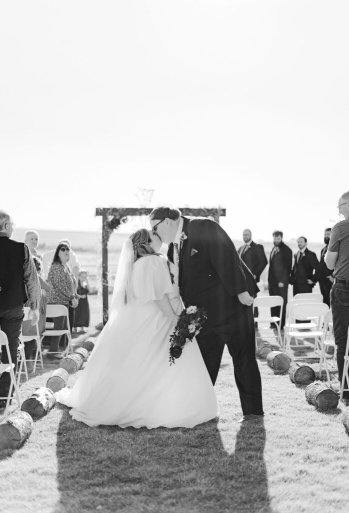 plus size organza ballgown wedding dress with sleeves chandler arizona bridal shop with plus size groom