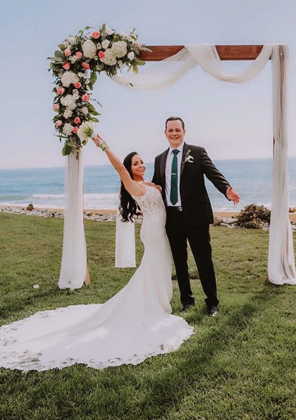 bride and groom crepe sexy lace wedding dress long beach california bridal shop